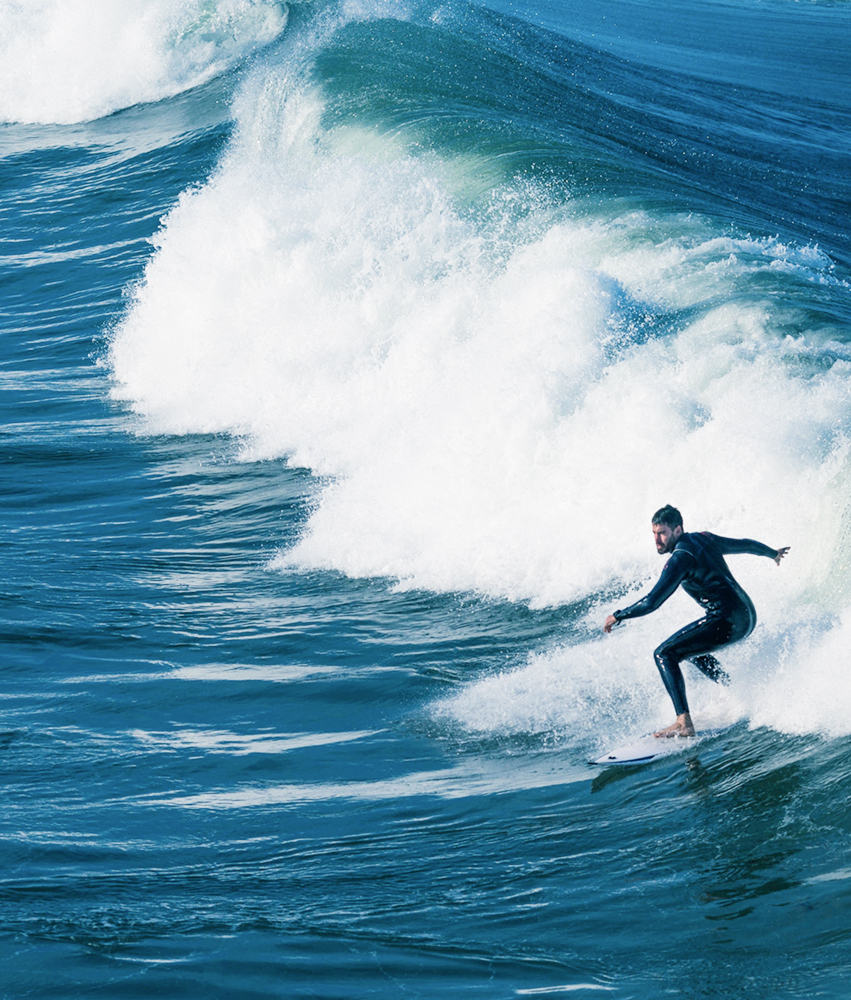 
                    riding a surfer